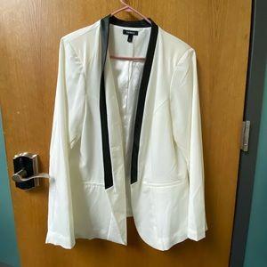 Torrid white jacket with leather style trim.